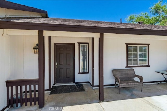 16117 Sweetaire Ave, Lancaster, CA 93535 - view of exterior entry featuring a porch and roof with shingles