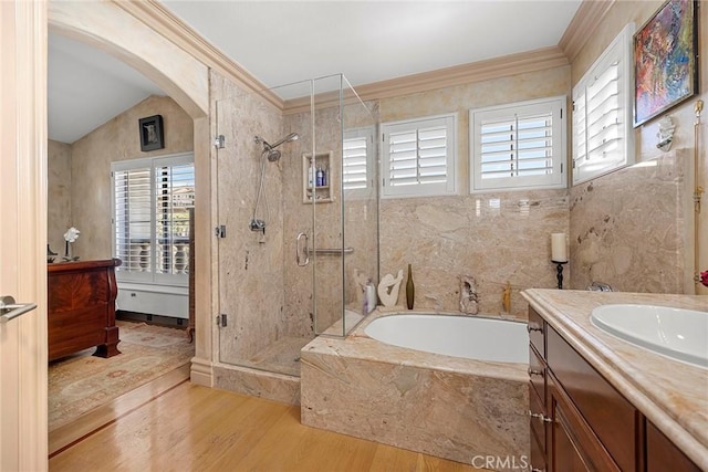 5 Monaco, Dana Point, CA 92629 - full bath featuring vanity, a bath, a stall shower, wood finished floors, and crown molding