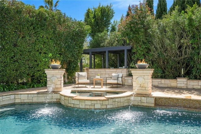 outdoor pool with an in ground hot tub