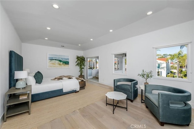 bedroom featuring baseboards, wood finished floors, visible vents, and recessed lighting