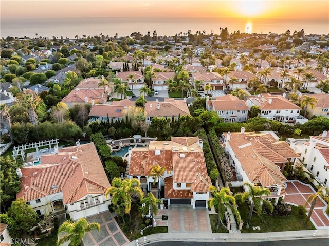 aerial view with a residential view and a water view