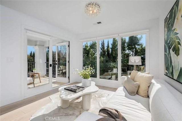 sunroom / solarium with visible vents