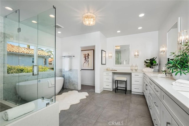full bathroom with a soaking tub, visible vents, recessed lighting, and double vanity