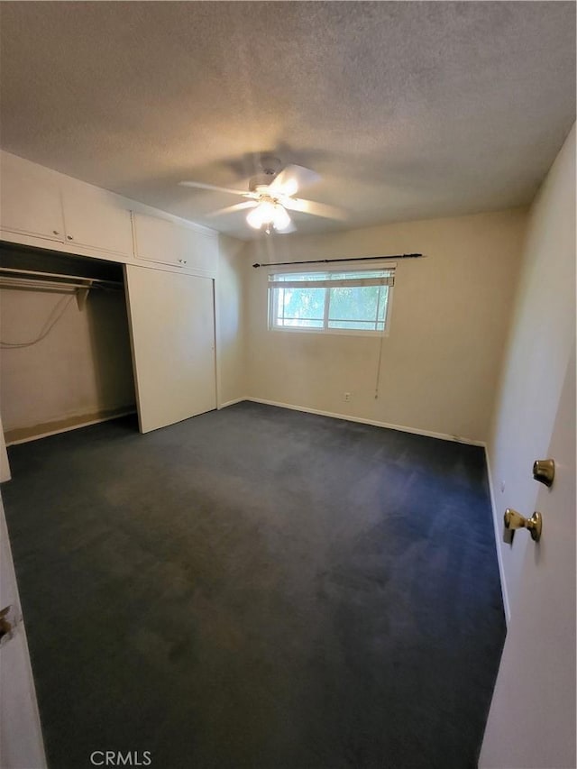 4322 Temescal Ave, Norco, CA 92860 - unfurnished bedroom featuring dark carpet, a textured ceiling, baseboards, and ceiling fan