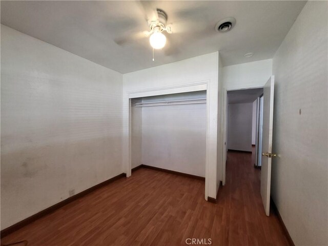 4322 Temescal Ave, Norco, CA 92860 - unfurnished bedroom featuring wood finished floors, a closet, ceiling fan, and baseboards