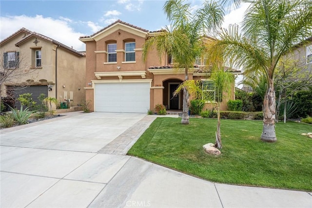 mediterranean / spanish home with a front lawn, stucco siding, a tiled roof, concrete driveway, and an attached garage
