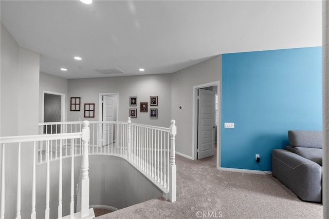 interior space featuring recessed lighting, carpet, and baseboards
