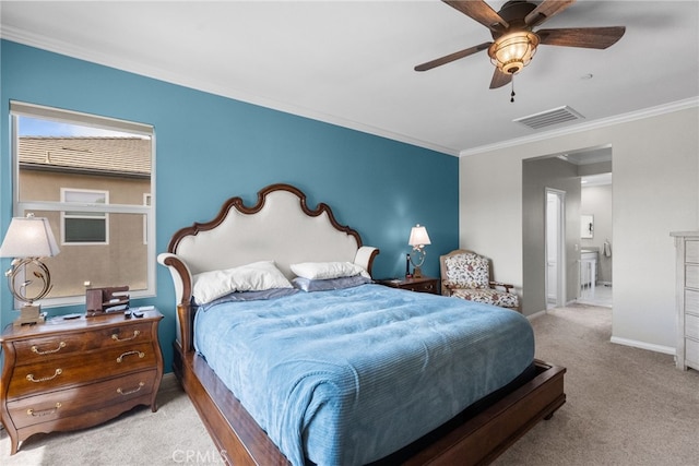 carpeted bedroom with visible vents, ceiling fan, crown molding, and baseboards