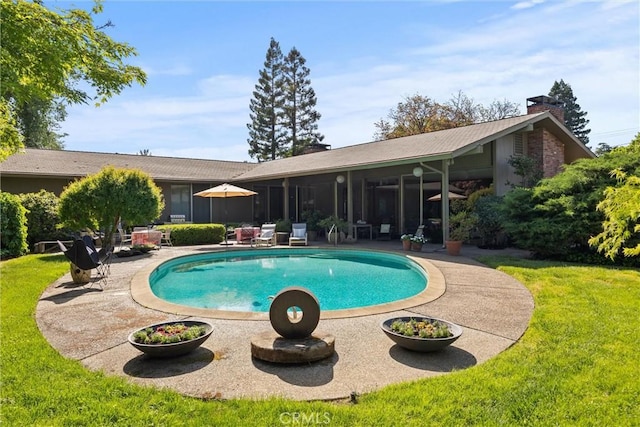 799 Hillview Way, Chico, CA 95926 - outdoor pool featuring a yard, a patio, and a sunroom