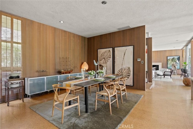 799 Hillview Way, Chico, CA 95926 - dining space with wood walls and a textured ceiling