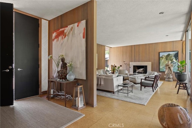 799 Hillview Way, Chico, CA 95926 - living area featuring tile patterned floors, wooden walls, and a textured ceiling