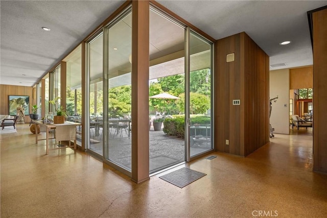 799 Hillview Way, Chico, CA 95926 - entryway featuring a wall of windows and wooden walls