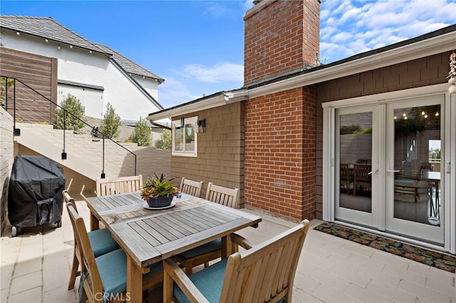 522 High Dr, Laguna Beach, CA 92651 - view of patio / terrace with a grill, french doors, and outdoor dining area