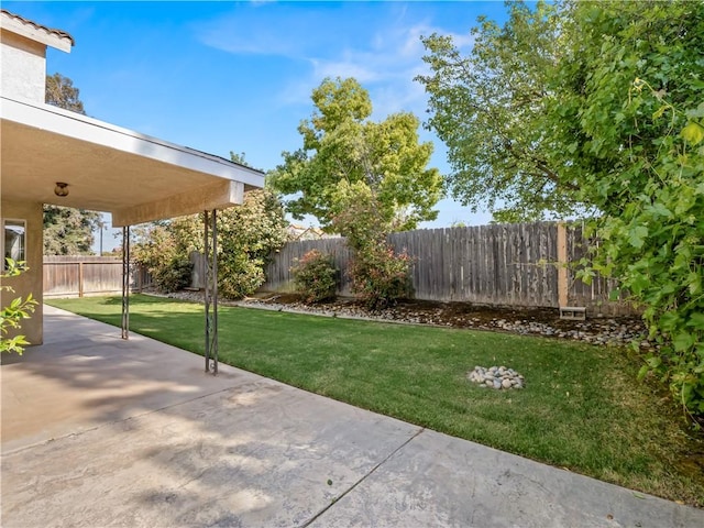 1523 E Pryor Dr, Fresno, CA 93720 - view of yard with a fenced backyard and a patio
