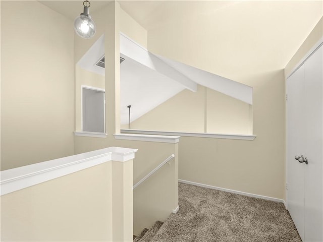 1523 E Pryor Dr, Fresno, CA 93720 - hallway with lofted ceiling with beams, visible vents, baseboards, an upstairs landing, and carpet floors