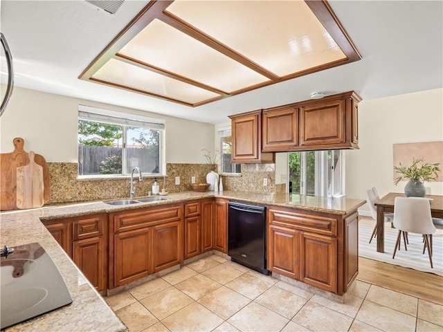 1523 E Pryor Dr, Fresno, CA 93720 - kitchen featuring a sink, light tile patterned flooring, backsplash, brown cabinets, and black appliances