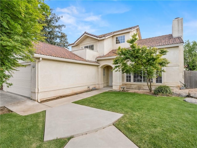 1523 E Pryor Dr, Fresno, CA 93720 - mediterranean / spanish home with a front yard, a chimney, a tiled roof, and stucco siding