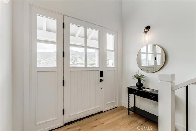 entrance foyer featuring light wood-style floors