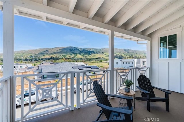 balcony featuring a mountain view