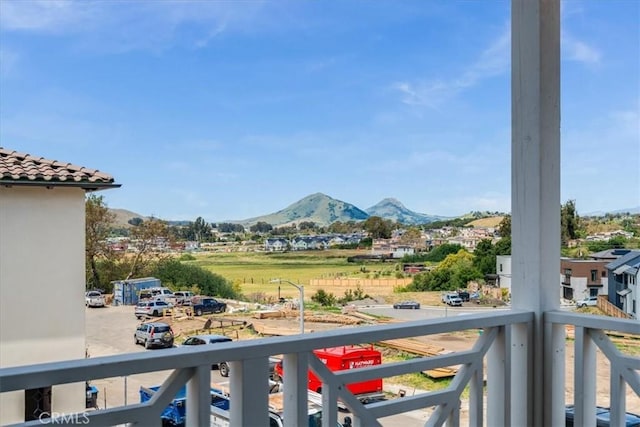 balcony featuring a mountain view