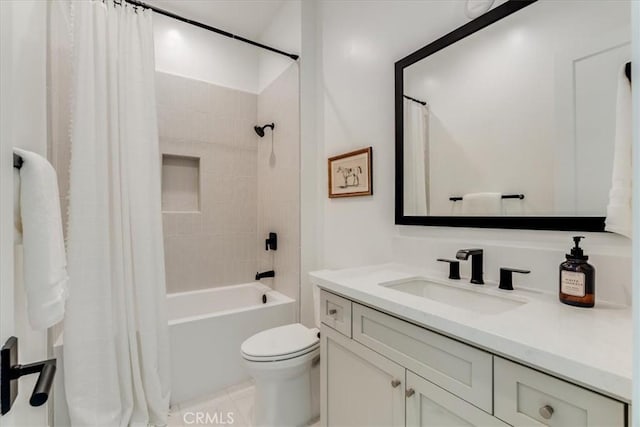 full bath featuring vanity, shower / bath combination with curtain, and toilet