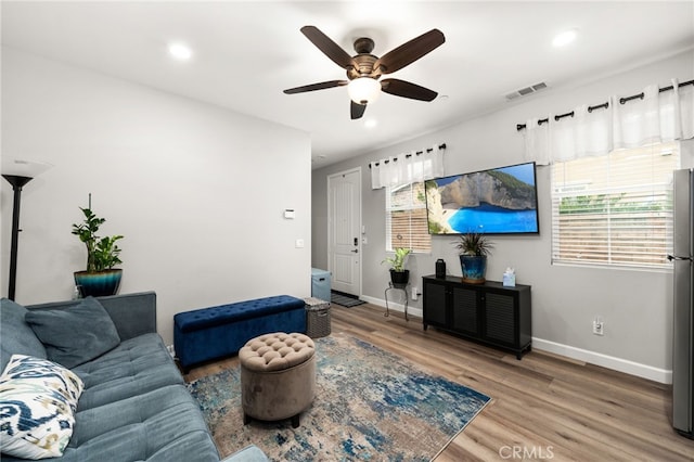 3693 S Grower Ave, Ontario, CA 91761 - living area with a ceiling fan, wood finished floors, baseboards, visible vents, and recessed lighting