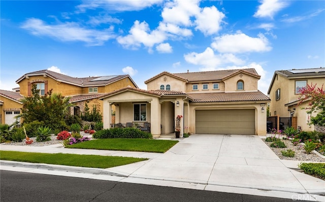 3693 S Grower Ave, Ontario, CA 91761 - mediterranean / spanish-style home featuring a tile roof, concrete driveway, covered porch, fence, and stucco siding