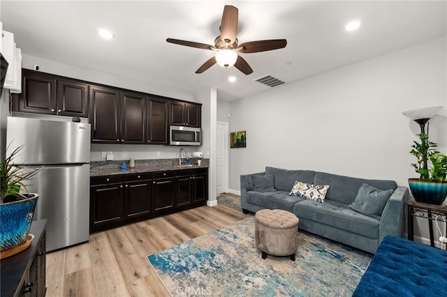 3693 S Grower Ave, Ontario, CA 91761 - living area with recessed lighting, light wood-style floors, visible vents, and ceiling fan