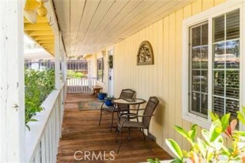 deck with covered porch