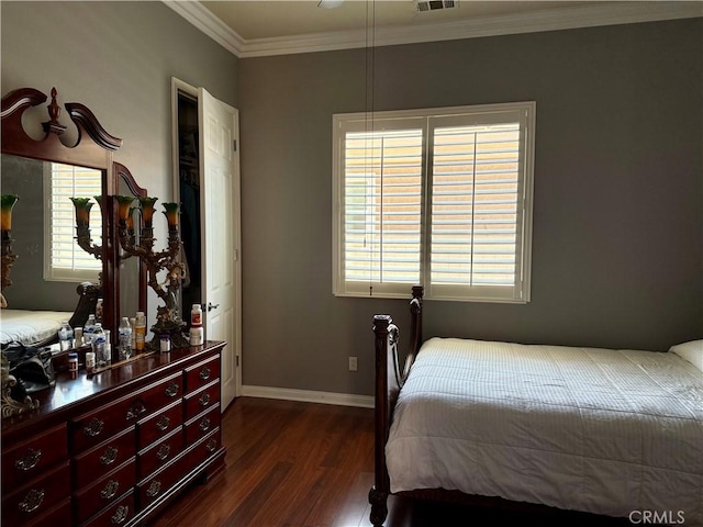 10485 Nobleton Rd, Apple Valley, CA 92308 - bedroom with ornamental molding, dark wood-style flooring, multiple windows, and visible vents