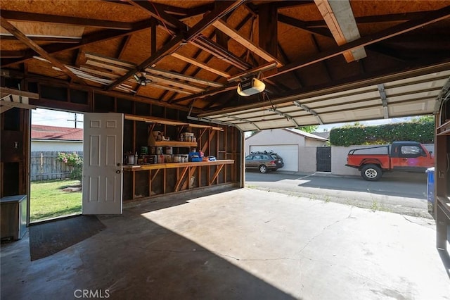 garage featuring a garage door opener