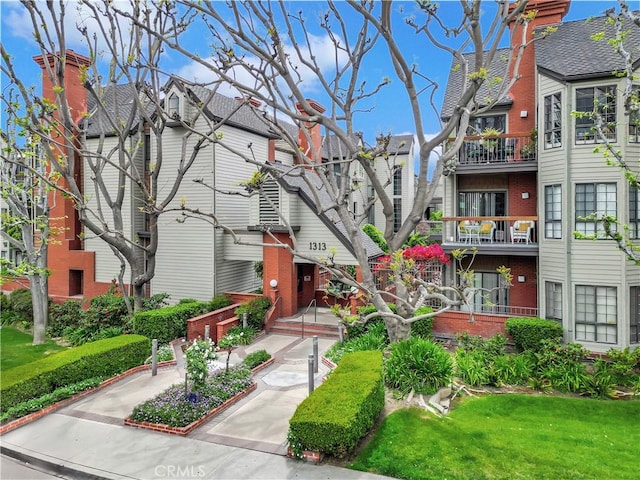 1313 Valley View Rd Unit 206, Glendale, CA 91202 - exterior space featuring brick siding and a residential view