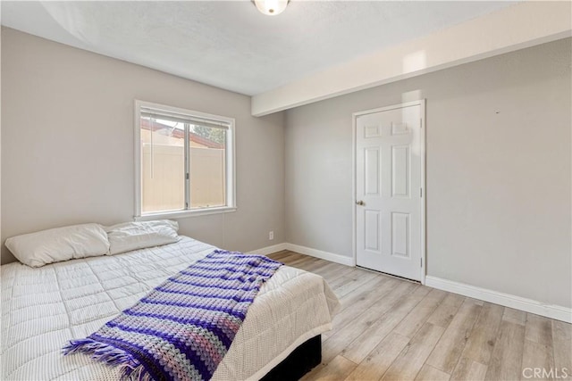 11485 Crafton, Mentone, CA 92359 - bedroom featuring light wood-style floors and baseboards
