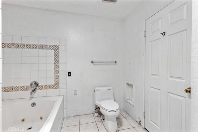 11485 Crafton, Mentone, CA 92359 - bathroom featuring a tub with jets, toilet, and tile patterned floors