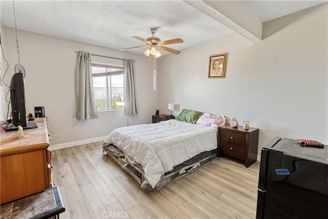 11485 Crafton, Mentone, CA 92359 - bedroom featuring light wood-style flooring, baseboards, freestanding refrigerator, and ceiling fan