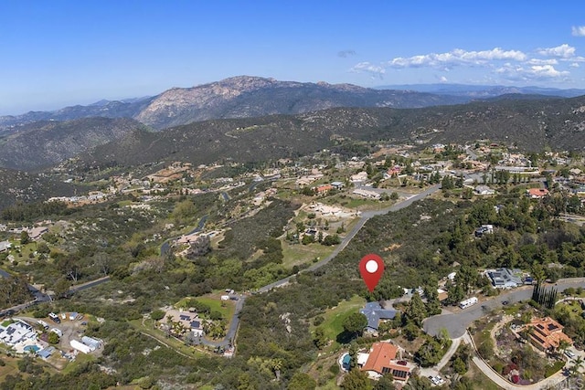 2406 Mcdougal Pl, Alpine, CA 91901 - aerial view of property and surrounding area featuring a mountain backdrop and nearby suburban area