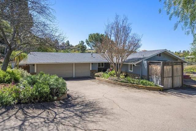 2406 Mcdougal Pl, Alpine, CA 91901 - ranch-style home with an attached garage and driveway