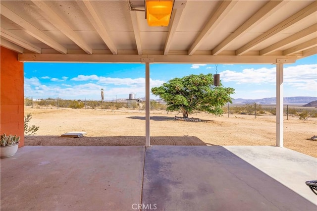 55850 Shannon Rd, Landers, CA 92285 - view of patio / terrace featuring a mountain view