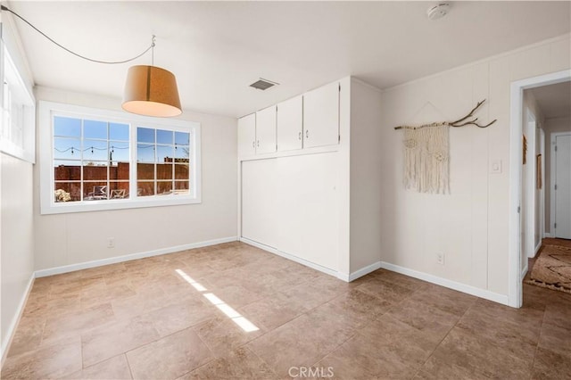 55850 Shannon Rd, Landers, CA 92285 - unfurnished bedroom with baseboards and visible vents