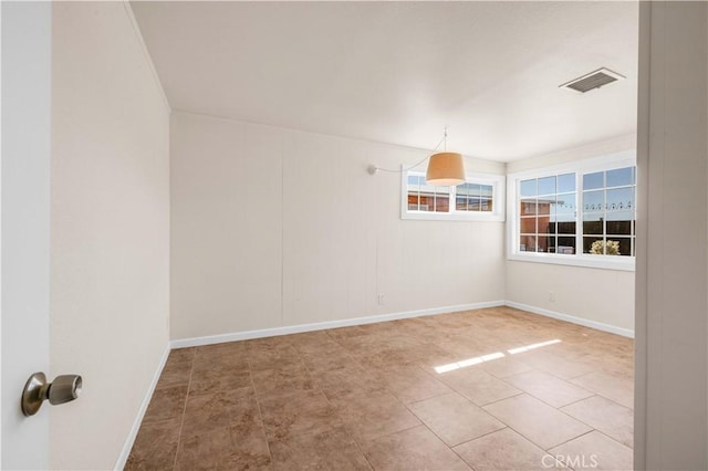 55850 Shannon Rd, Landers, CA 92285 - spare room featuring visible vents and baseboards