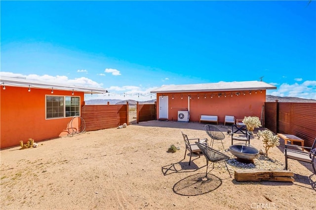 55850 Shannon Rd, Landers, CA 92285 - view of yard featuring a fenced backyard and a fire pit