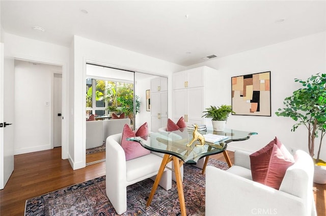 1400 N Sweetzer Ave Unit 102, West Hollywood, CA 90069 - dining room with dark wood-type flooring and baseboards