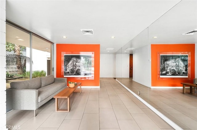 1400 N Sweetzer Ave Unit 102, West Hollywood, CA 90069 - building lobby featuring recessed lighting and floor to ceiling windows