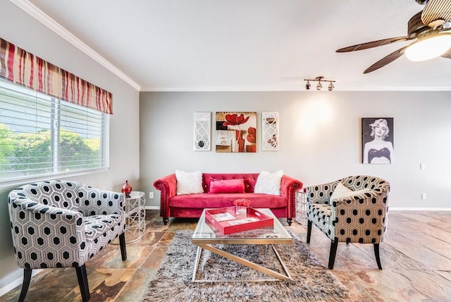 800 E Cottonwood Rd Unit 2, Palm Springs, CA 92262 - living area featuring stone tile floors, ornamental molding, a ceiling fan, and baseboards