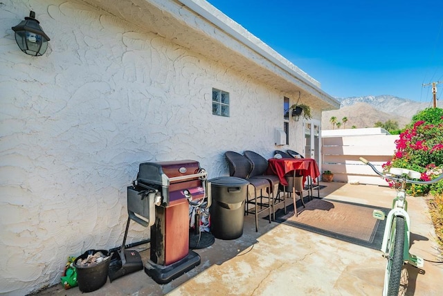 800 E Cottonwood Rd Unit 2, Palm Springs, CA 92262 - view of patio / terrace with a mountain view and area for grilling