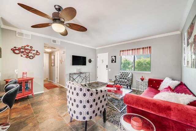 800 E Cottonwood Rd Unit 2, Palm Springs, CA 92262 - living area featuring stone finish floors, crown molding, ceiling fan, and baseboards