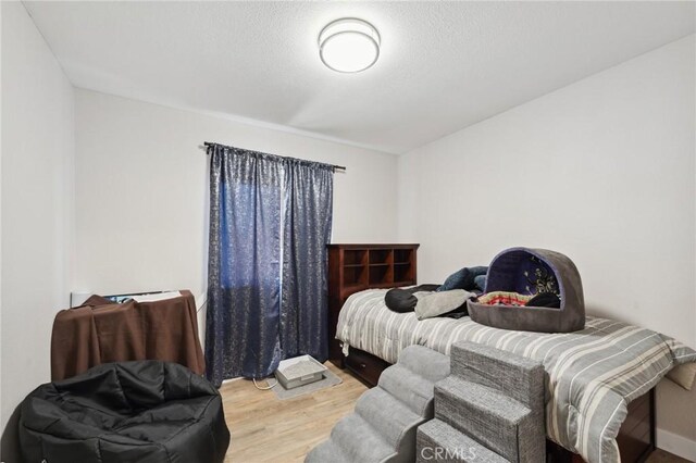 10616 Jamul Rd, Apple Valley, CA 92308 - bedroom with wood finished floors
