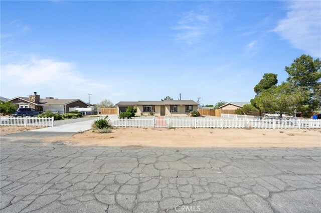 10616 Jamul Rd, Apple Valley, CA 92308 - view of front of house with a fenced front yard