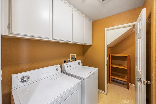 6356 Claridge Dr, Riverside, CA 92506 - laundry area featuring cabinet space, baseboards, washer and clothes dryer, and light floors