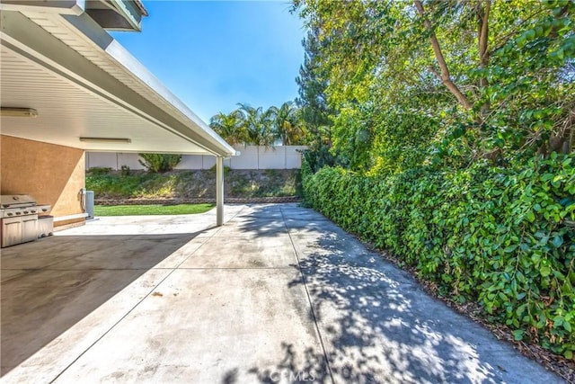6356 Claridge Dr, Riverside, CA 92506 - view of patio with fence and a grill